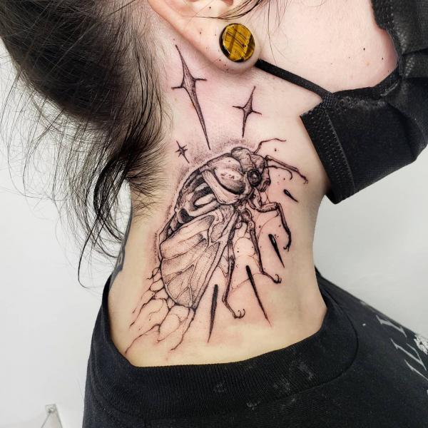 Cicada neck tattoo