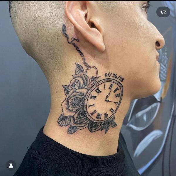 Clock with rose neck tattoo