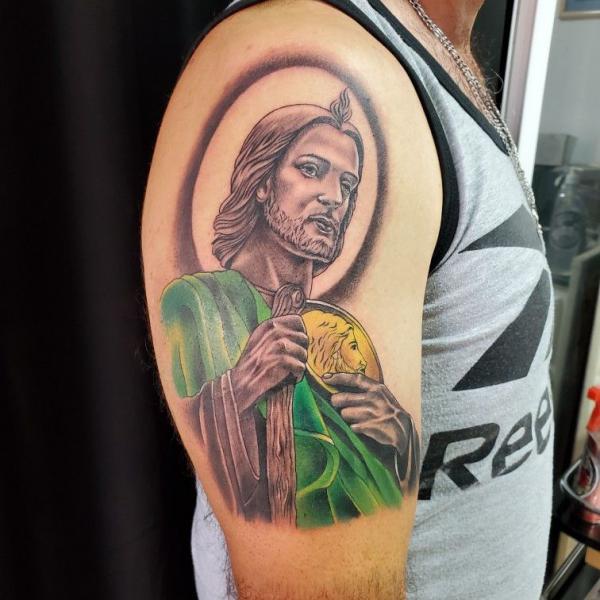 Colored San Judas half sleeve tattoo