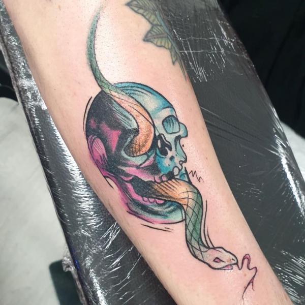 Colored death eater forearm tattoo