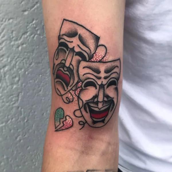 Colored laugh now cry later with broken heart tattoo