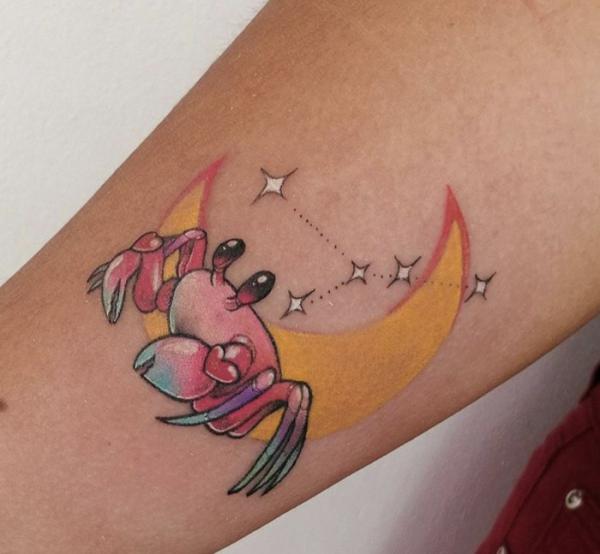 Colorful Zodiac cancer with moon and stars constellation tattoo