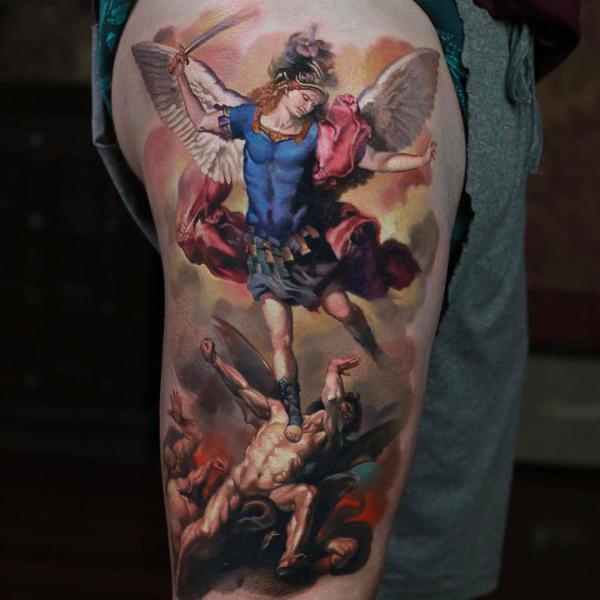 Colorful angel michael slaying the devil tattoo
