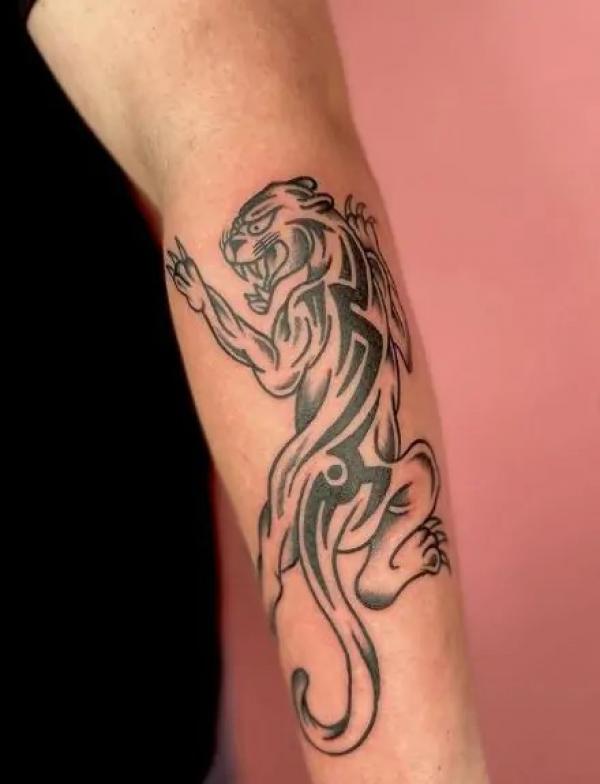 Crawling panther tattoo tribal style
