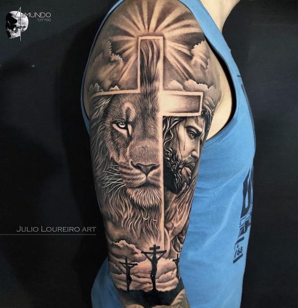 Cross lion and Jesus tattoo