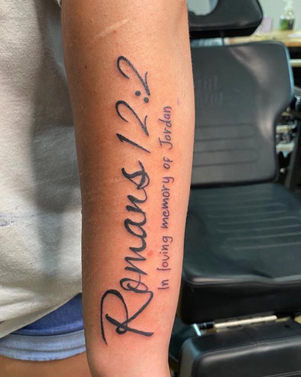 Cursive romans 12 2 lettering tattoo