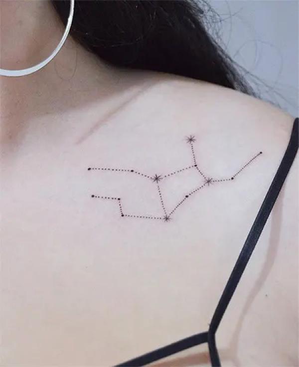 Dotted Virgo constellation clavicle tattoo