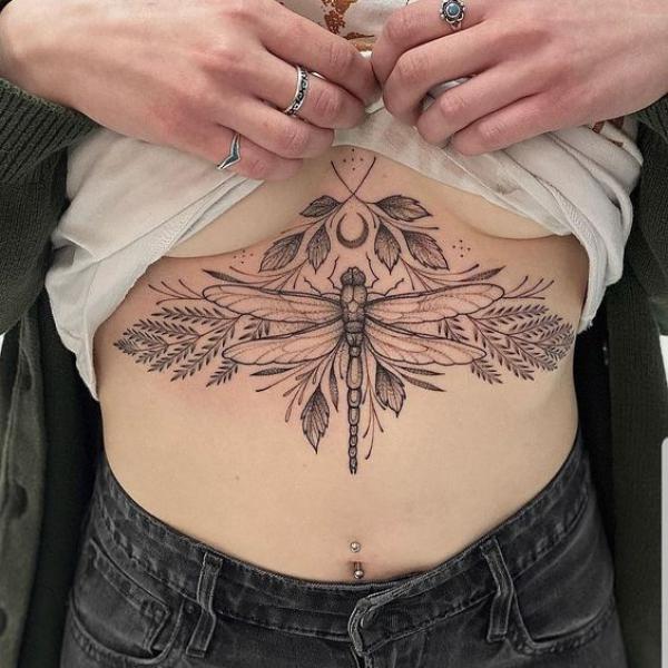 Dragonfly and fern stomach tattoo