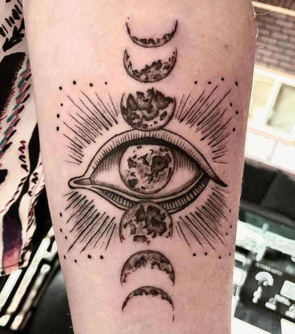 Eye Moon phases tattoo