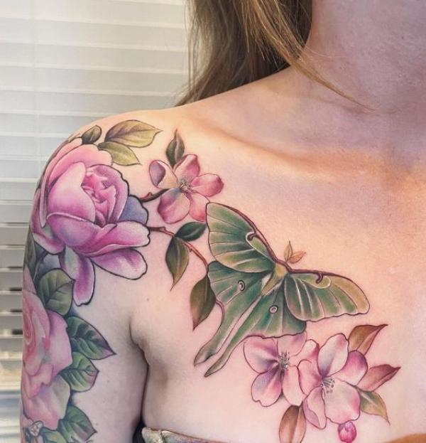 Feminine luna moth and flowers shoulder to chest tattoo