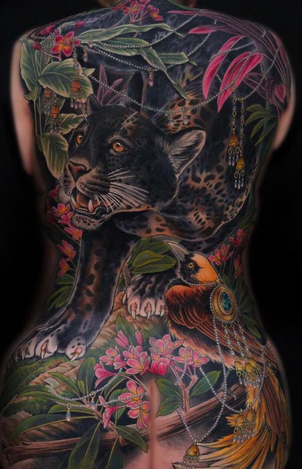 Feminine panther and bird full back tattoo
