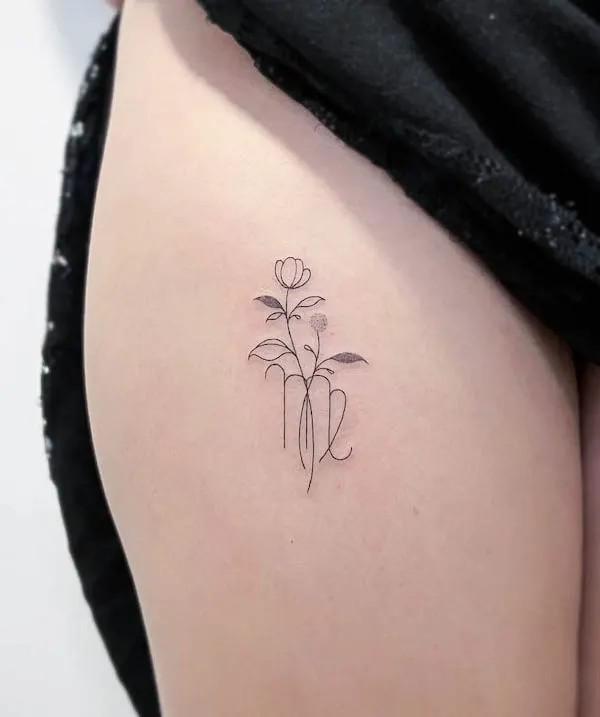 Fine line floral Virgo tattoo on thigh
