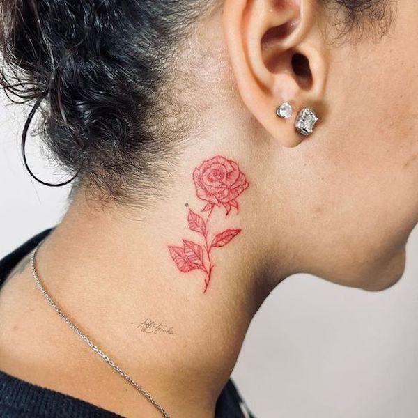 Fine line red rose neck tattoo
