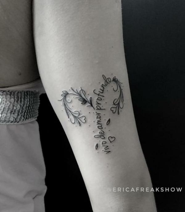 Floral Aries glyph tattoo with words