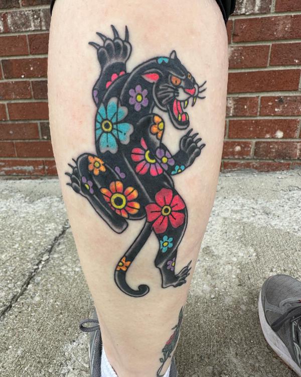 Floral panther calf tattoo