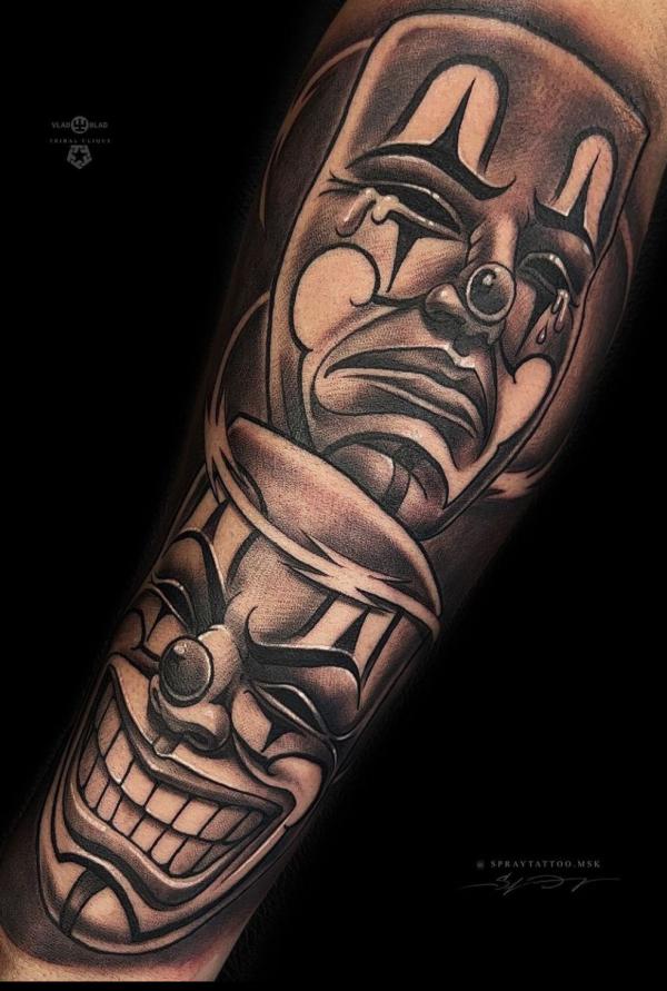 Gemini joker forearm tattoo