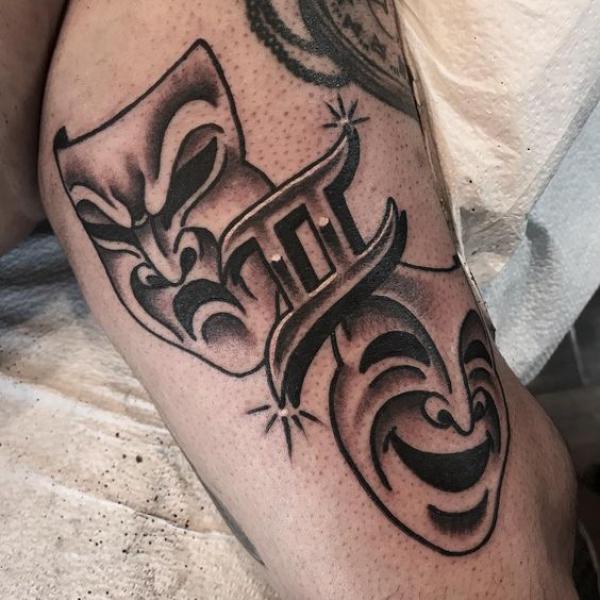 Gemini joker with glyph tattoo