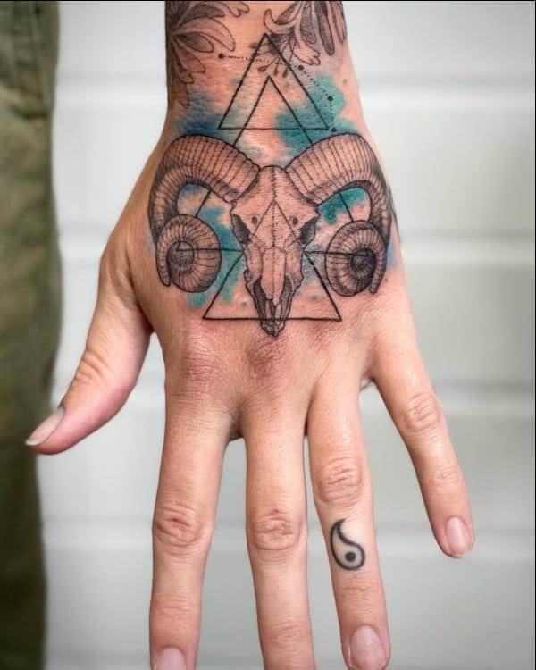 Geometric Aries hand tattoo