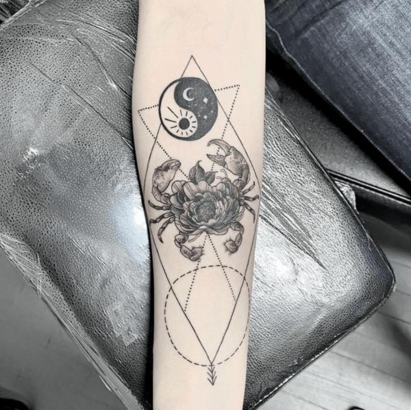 Geometric Zodiac cancer crab with sun and moon Yin Yang tattoo