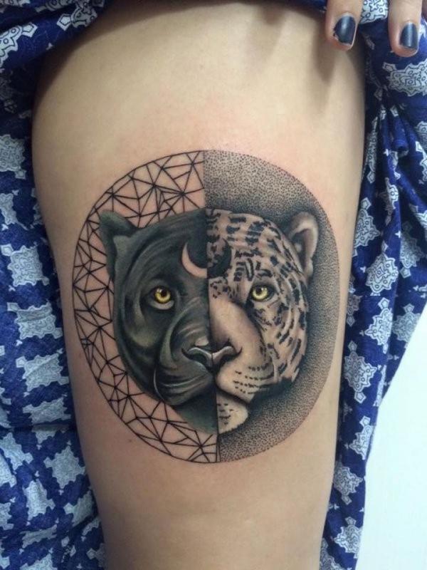 Geometric black panther and jaguar tattoo on thigh