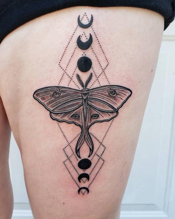 Geometric luna moth and moon phases tattoo