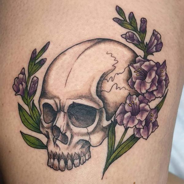 Gladiolus and skull tattoo