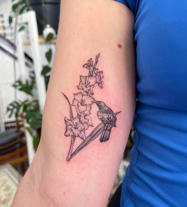 Gladiolus and tui bird tattoo
