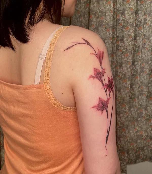 Gladiolus upper arm tattoo