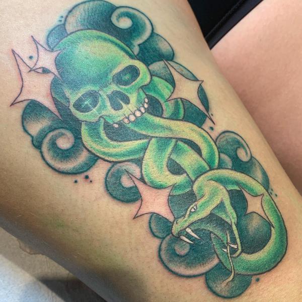 Green death eater with stars tattoo
