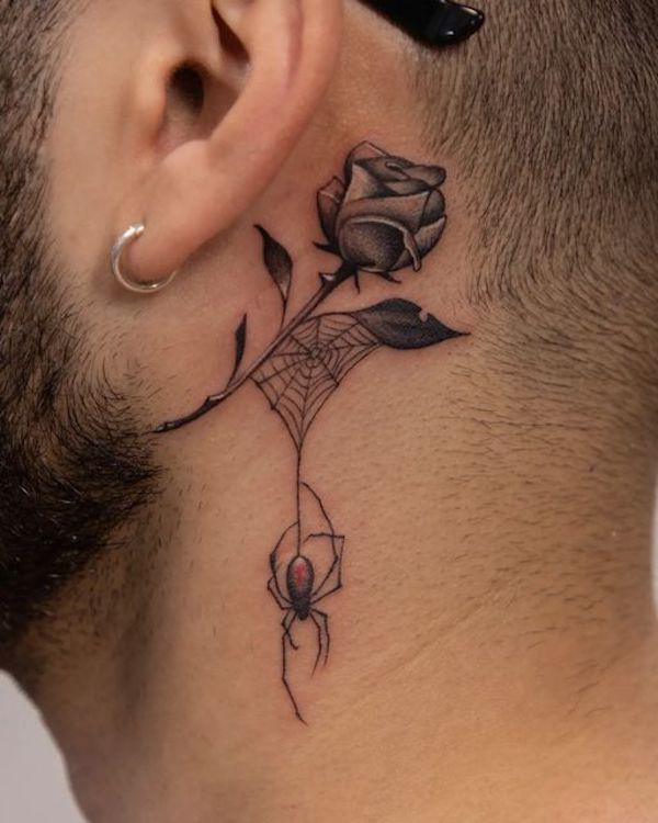 Greyscale rose and spiderweb with a spider neck tattoo