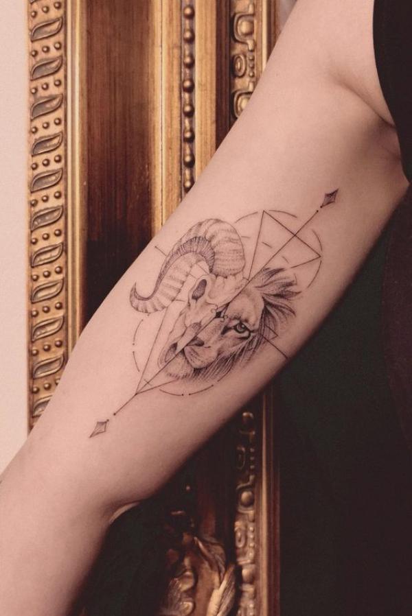 Half Leo lion half Aries Ram skull tattoo