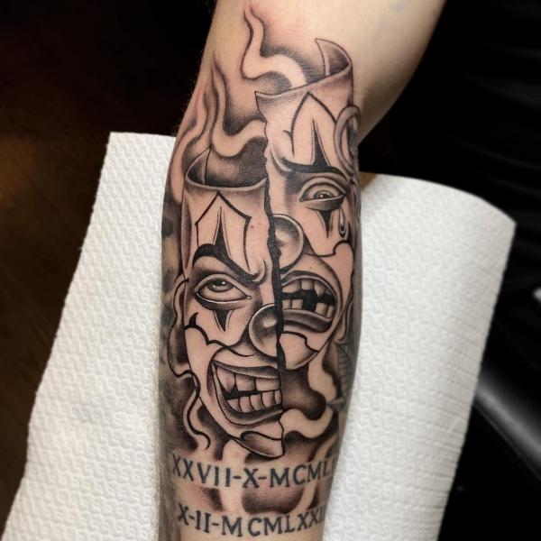 Half Smile half Cry mask tattoo