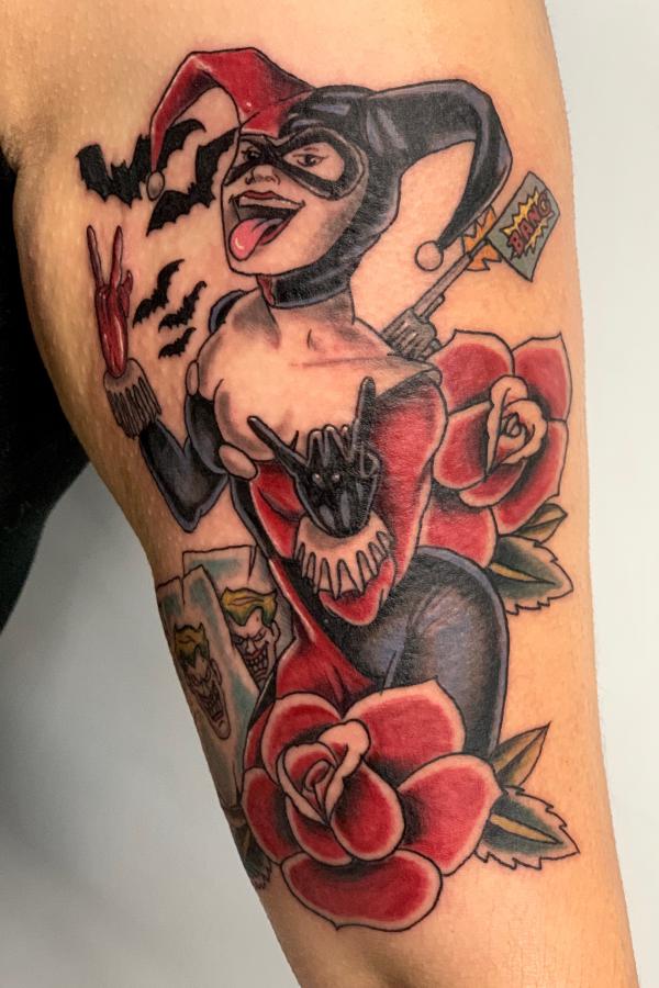 Harley Quinn and traditional rose tattoo