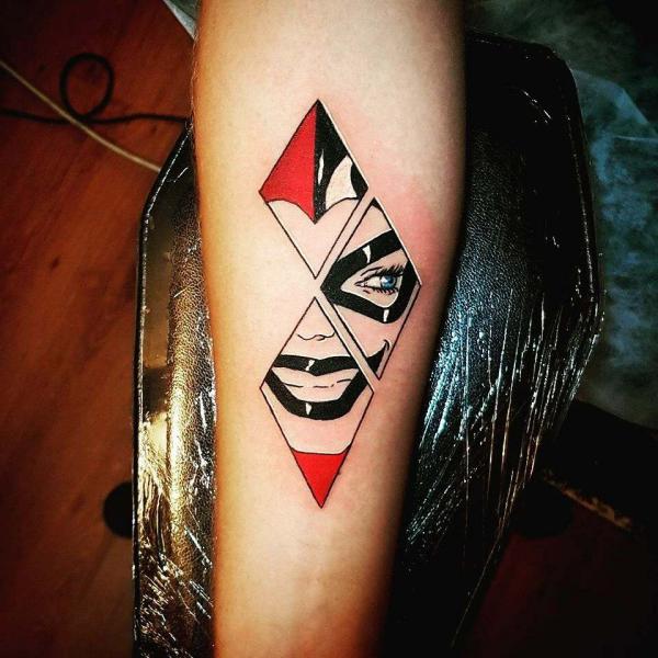 Harley Quinn diamond face tattoo