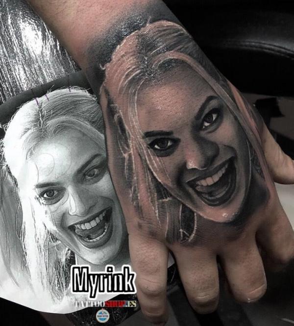 Harley Quinn face hand tattoo realistic