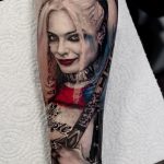 Harley Quinn holding her baseball bat forearm tattoo