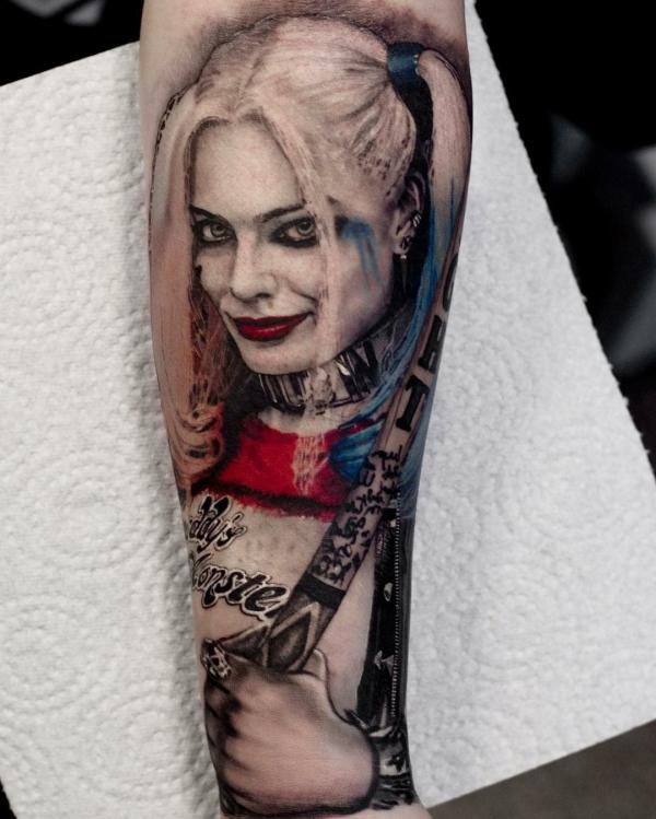 Harley Quinn holding her baseball bat forearm tattoo