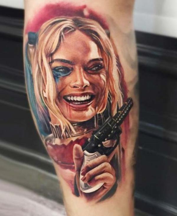 Harley Quinn with gun tattoo