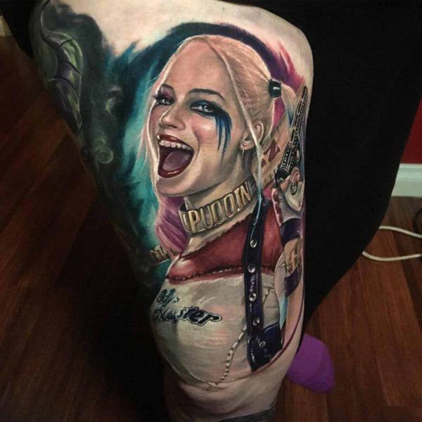 Harley Quinn with gun thigh tattoo realistic