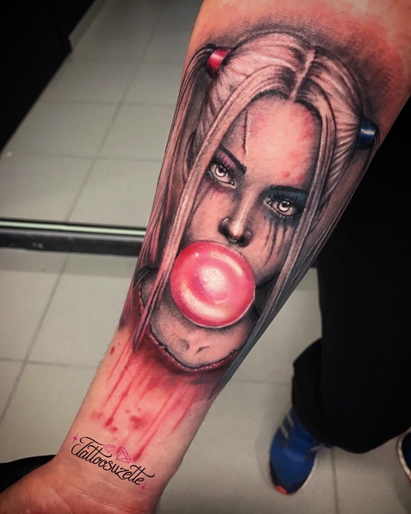 Harley quinn chewing gum forearm tattoo