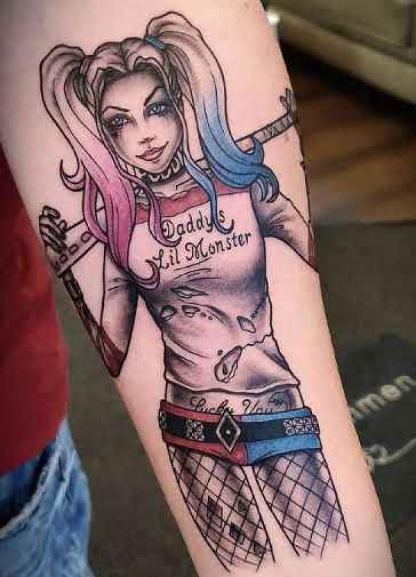 Harley quinn wearing Daddys Lil monster shirt forearm tattoo