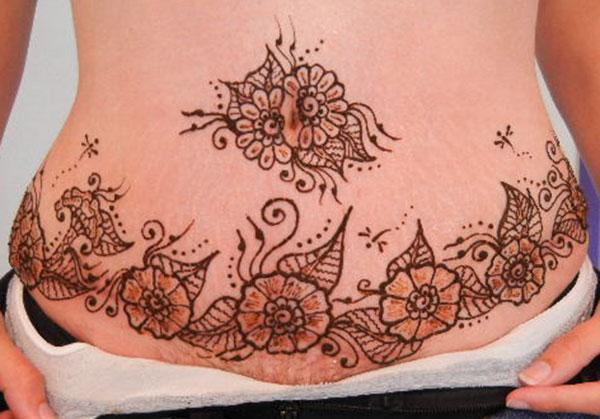 Henna flowers stomach tattoo