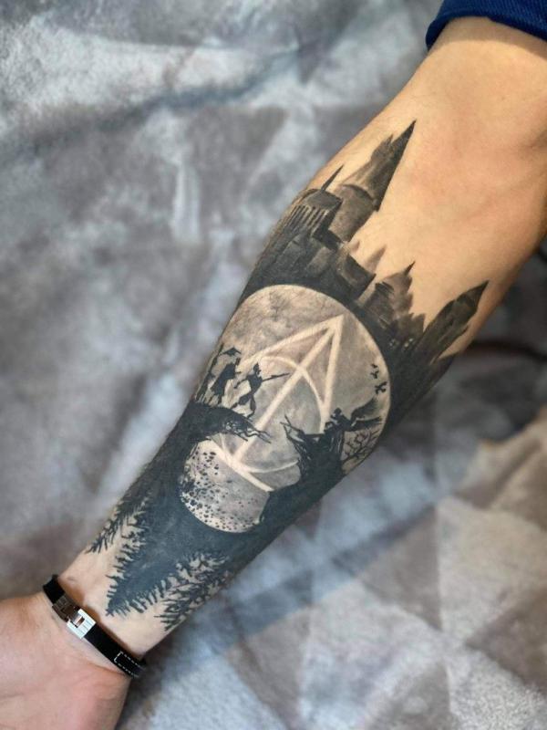 Hogwarts School and deathly hallows tattoo
