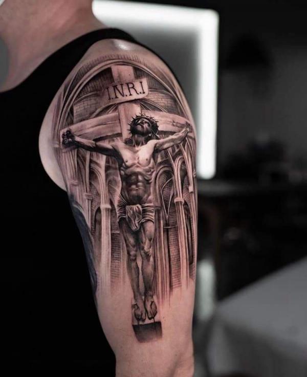 INRI on cross tattoo with jesus half sleeve