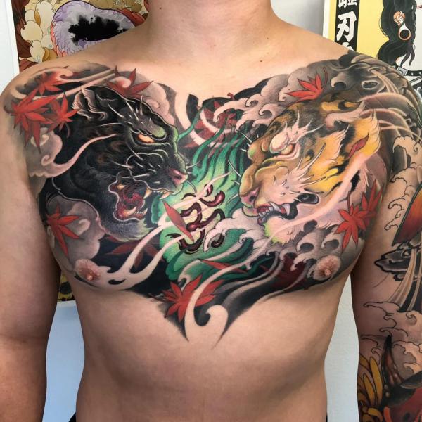 Japanese panther and tiger with OM symbol tattoo