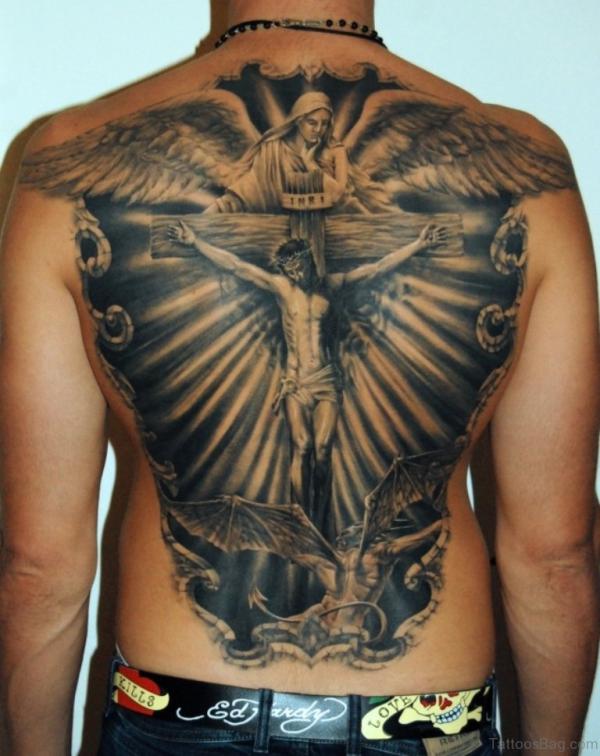 Jesus on Cross with halo and Virgin Mary back tattoo