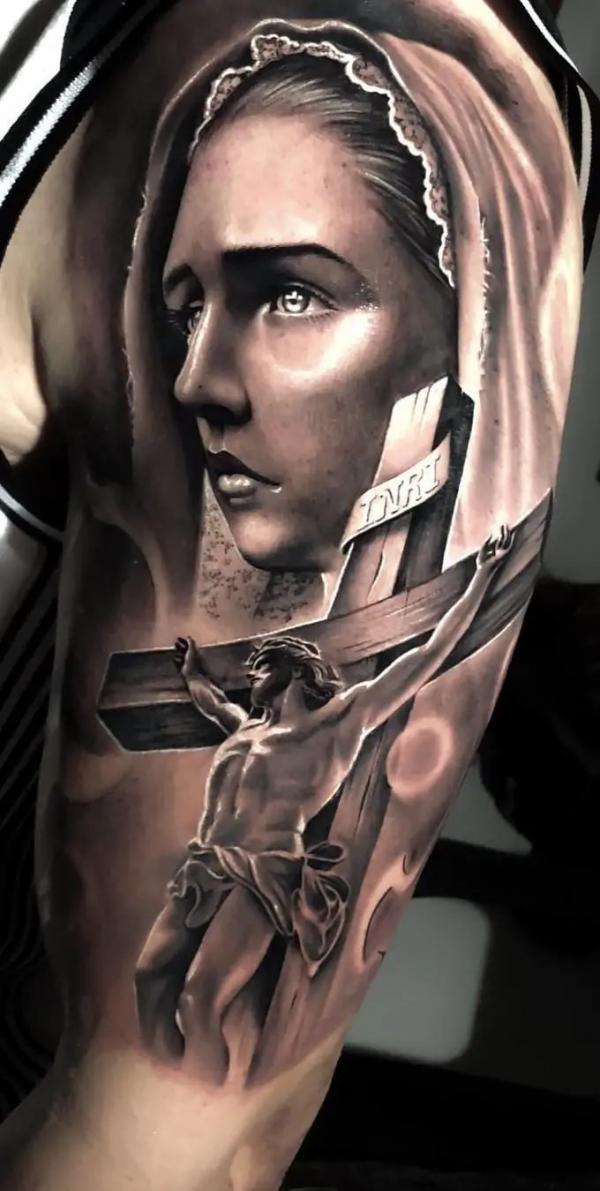 Jesus on cross with Virgin Mary tattoo