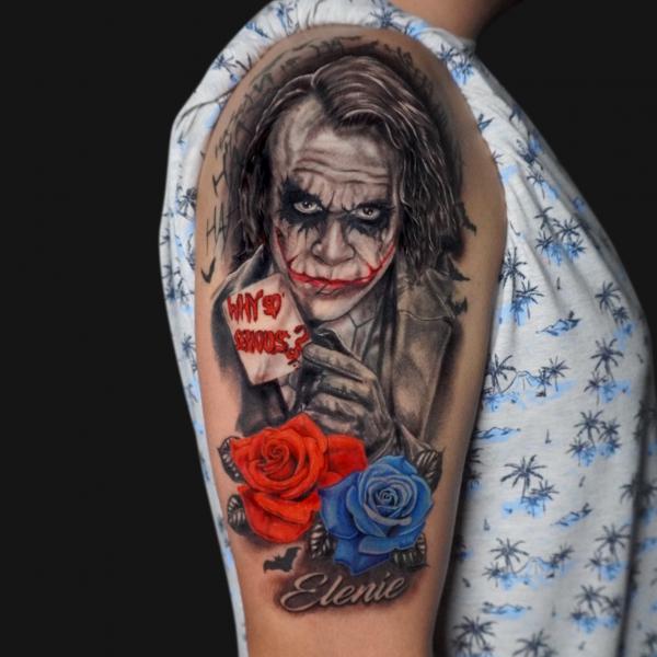 Joker with red and blue rose half sleeve tattoo