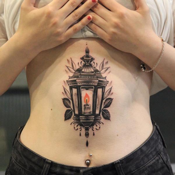 Lantern stomach tattoo