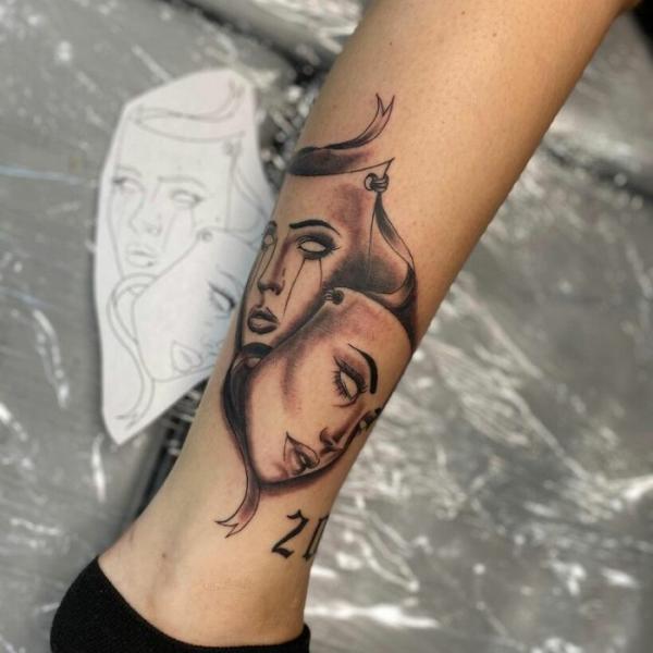 Laugh Now Cry Later lower leg tattoo